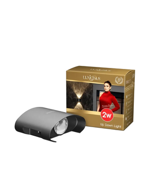 Black up-down light fixture next to its packaging on a white background